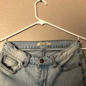 Light acid wash denim skinny jeans